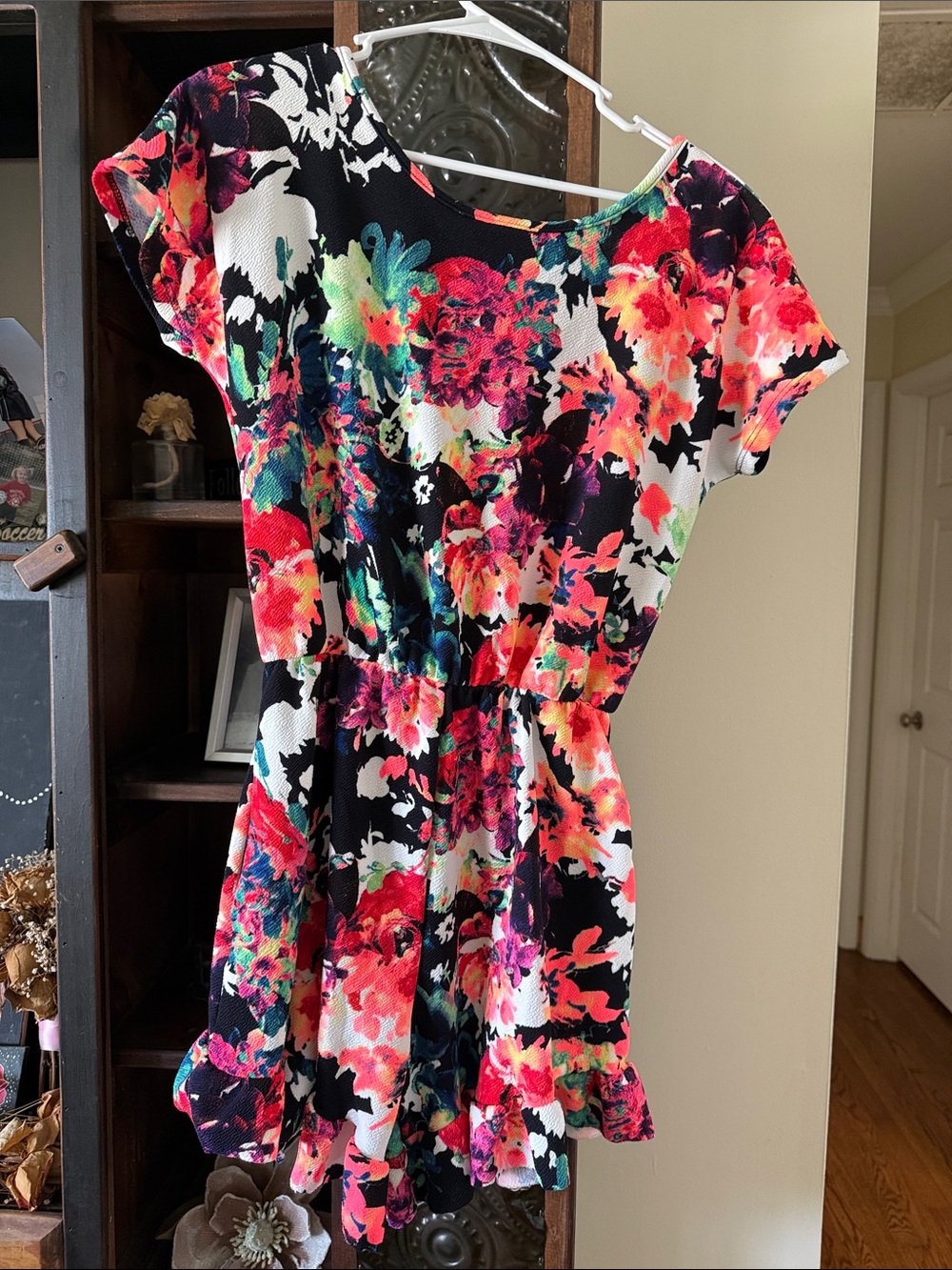 HEIMISH USA Black Multi Floral Ruffle-Hem Jumpsuit Romper